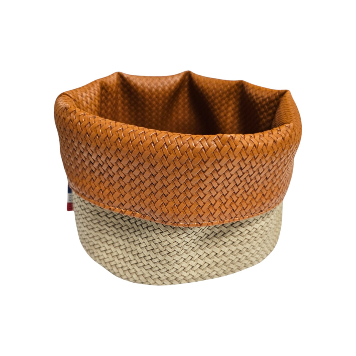 Panière en similicuir imperméable, facile à nettoyer, idéale pour un usage quotidien.