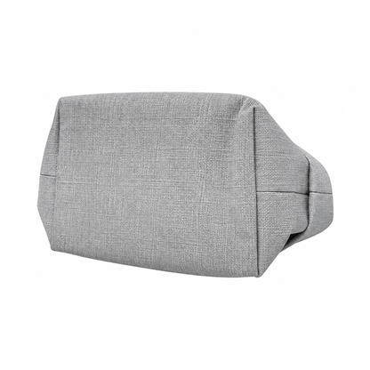 Panière en similicuir imperméable, facile à nettoyer, idéale pour un usage quotidien.