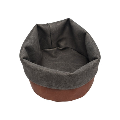 Panière en similicuir imperméable, facile à nettoyer, idéale pour un usage quotidien.
