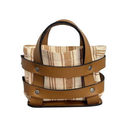Panière en similicuir imperméable et tissu, facile à nettoyer, idéale pour un usage quotidien.