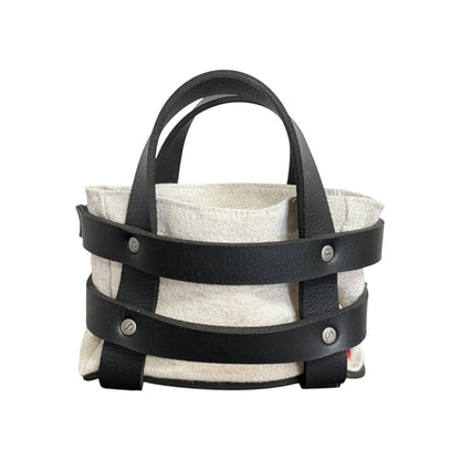 Panière en similicuir imperméable et tissu, facile à nettoyer, idéale pour un usage quotidien.